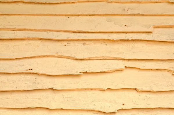 Vecchio muro di legno verniciato giallo — Foto Stock