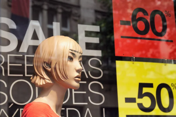 stock image Discount signs in a shop window.