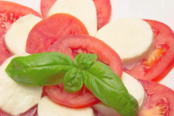 Salad of mozzarella, tomato and basil. — Stock Photo, Image