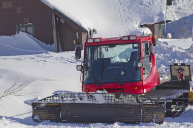 A snow groomer ready to use clipart
