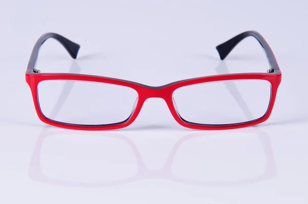 Lectura gafas rojas —  Fotos de Stock