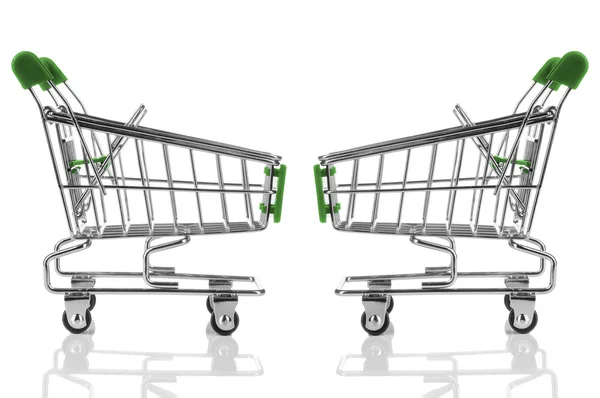 Dvě zelené nákupní vozík, samostatný — Stock fotografie