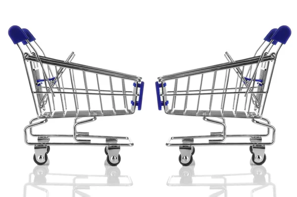 Dois carrinho de compras azul isolado — Fotografia de Stock