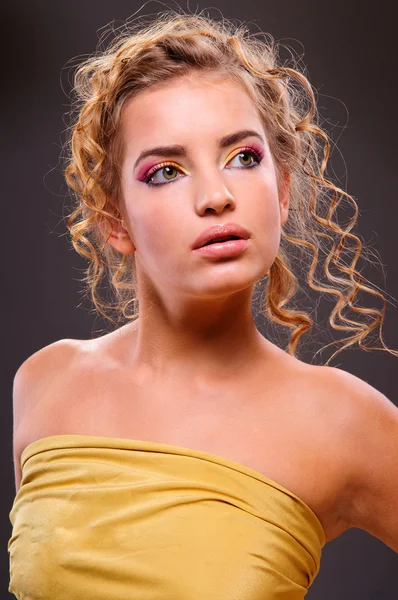 Beautiful woman with volume and shiny curly hair style, bright lips make-up — Stok fotoğraf