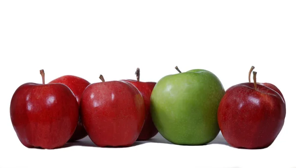Red apples with one green apple — Stock Photo, Image