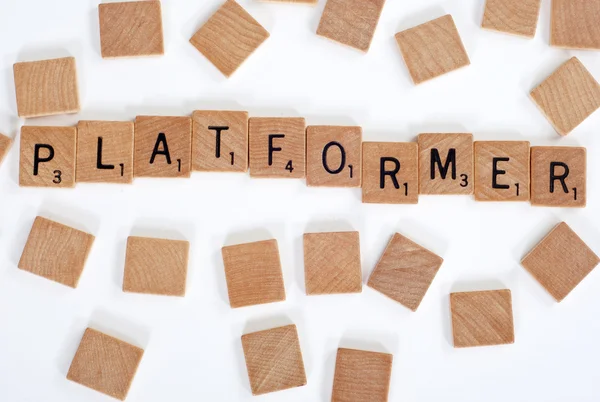 Scrabble tiles spell out 'Platformer'