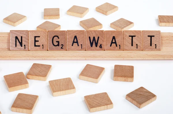 Scrabble tiles spell out 'Negawatt' — ストック写真