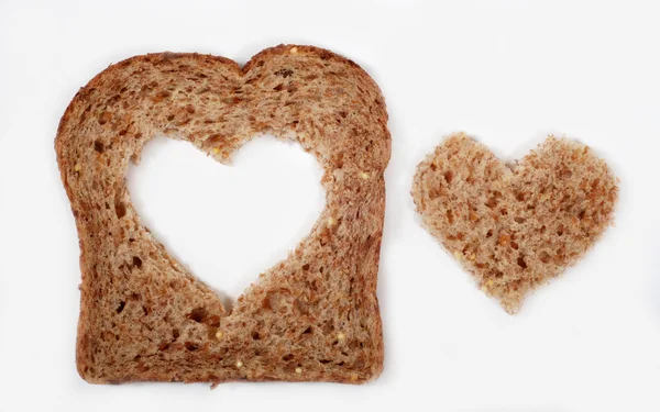 Pan integral con corazón Imagen De Stock