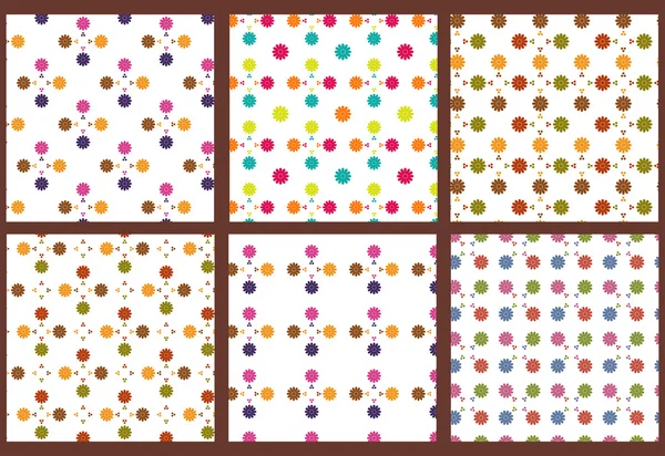 Set of flower seamless backgrounds — Stock Vector