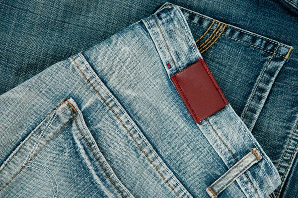 Pohled label prázdné kožené džíny — Stock fotografie