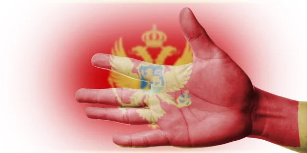Bemalen der montenegrinischen Nationalflagge — Stockfoto