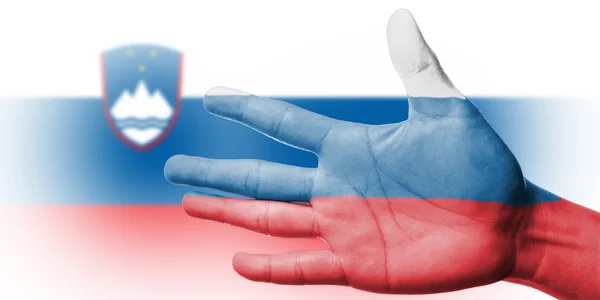 Abanico animador con pintura Eslovenia bandera nacional con su mano — Foto de Stock