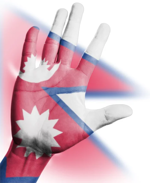 Asien jubelnder Fan mit dem Bemalen der nepalesischen Nationalflagge mit der Hand — Stockfoto