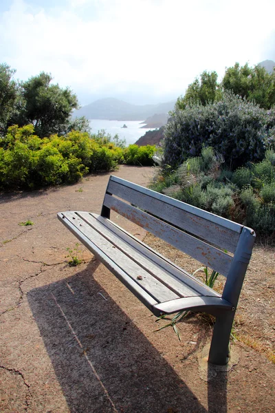 Stock image Wooden bench with a view