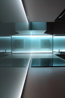 Kitchen with white led lighting clipart