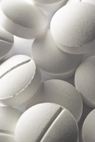 Duże białe tabletki makro — Zdjęcie stockowe