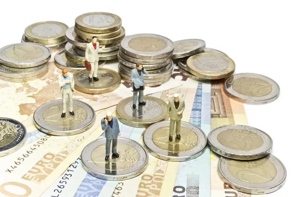 Miniature euro businessmen — Stock Photo, Image