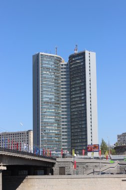 The building is in the form of a book on New Arbat Street in Moscow clipart