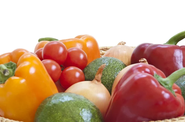 stock image Fresh vegetables in a basket isolated on white background