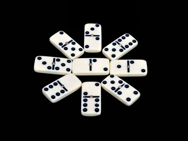 Domino isolé sur fond noir — Photo