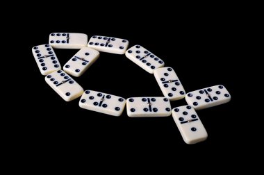 Domino isolated on a black background clipart