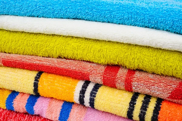 Colorful towels isolated on white background — Stock Photo, Image