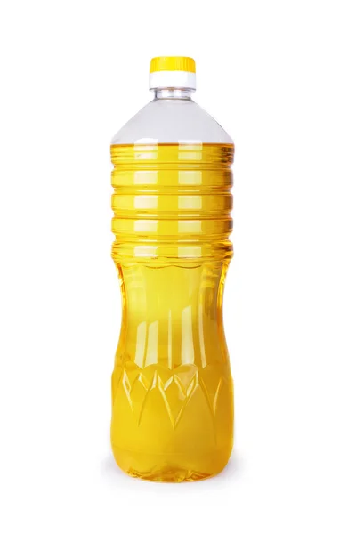 Aceite en una botella aislado sobre un fondo blanco —  Fotos de Stock