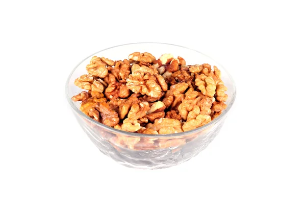 Vlašské ořechy v talíř na bílém pozadí — Stock fotografie