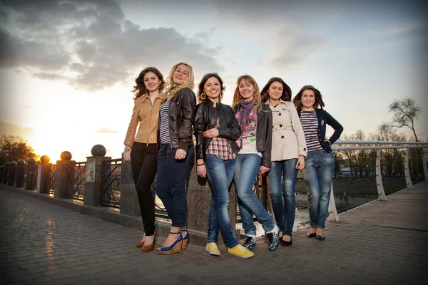 Beautiful girls on the bridge — Stock Photo, Image