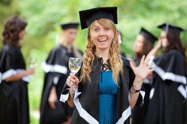 Bachelor's graduates celebrate clipart