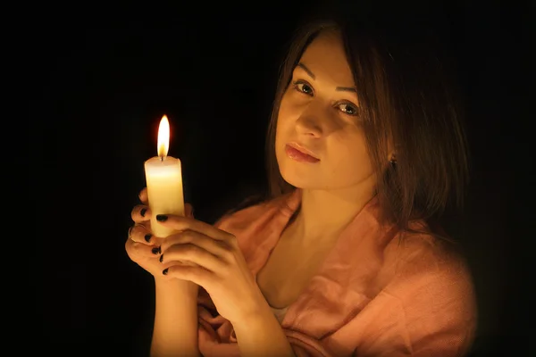 一支蜡烛的女人 — 图库照片