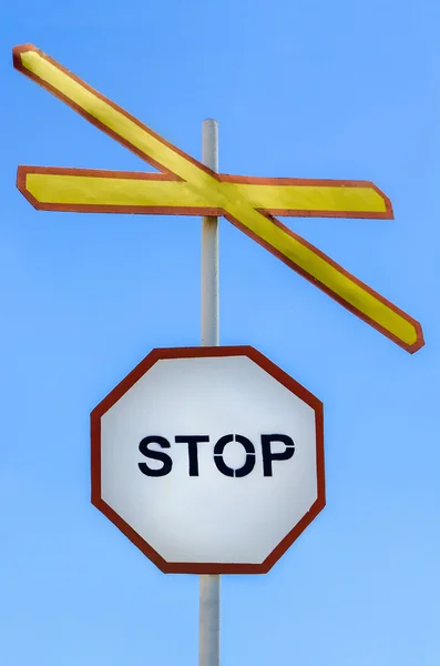 Stop and Railway crossing signs Stock Image