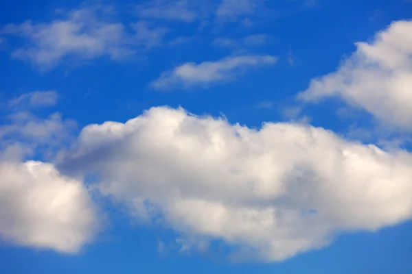 stock image Clear blue sky with fair weather clouds