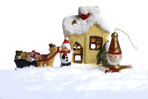 Kerstboom decoraties en een theelicht — Stockfoto