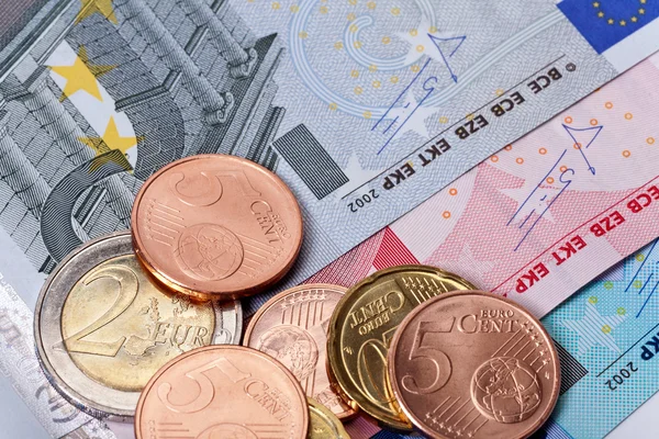 Monete e banconote in euro — Foto Stock
