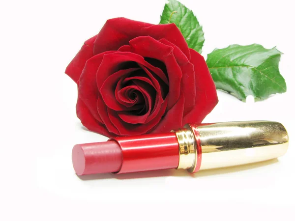 Red lipstick with rose on background — Stock Photo, Image