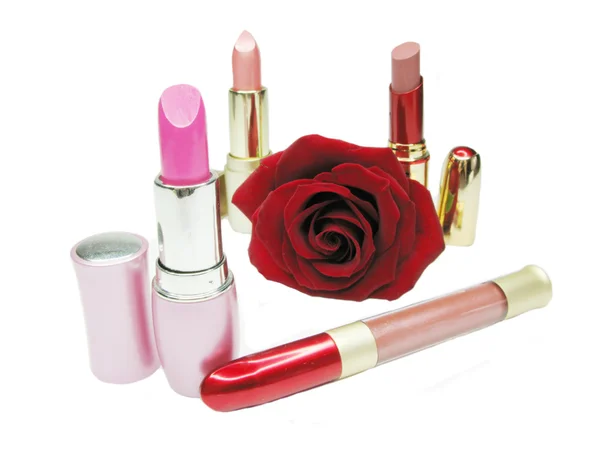 Lipsticks with rose on background — Stock Photo, Image