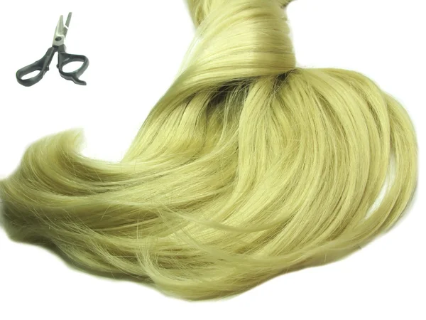 Nůžky v blond vlasy — Stock fotografie