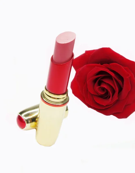 Red lipstick with rose on background Royalty Free Stock Photos