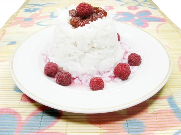 Rice porridge with raspberry — Stock Photo, Image