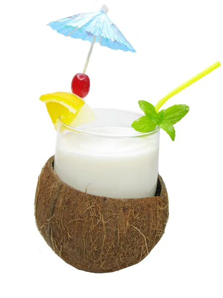 Fruit cocktail juice drink in coconut — Stock Photo, Image