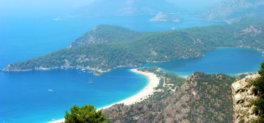 Panorama of blue lagoon and beach oludeniz turkey clipart