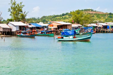 Fishing village and boats in the background of the hill, Sihanoukville, Cambodia clipart