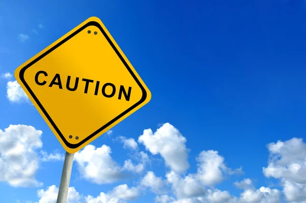 Caution traffic sign on bluesky — Stock Photo, Image