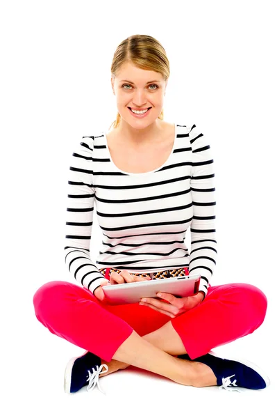Beautiful woman using her tablet pc — Stock Photo, Image