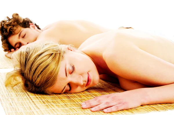 Attractive young couple on spa treatments — Stock Photo, Image