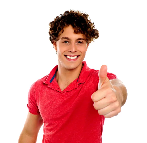 Handsome young man gesturing thumbs-up — Stock Photo, Image