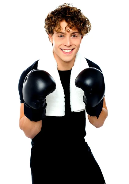 Boxer boy in sports outfit ready to punch you — Stock Photo, Image