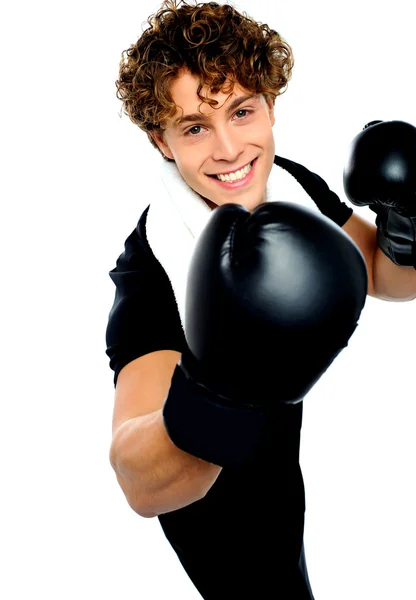 Young man in a aggressive action — Stock Photo, Image