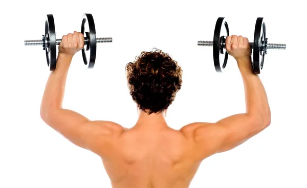 Rear view of a young male bodybuilder — Stock Photo, Image